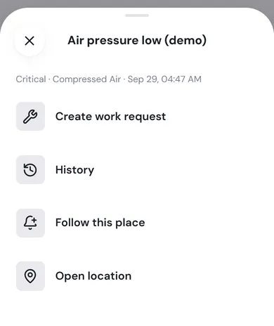 The menu for the alarm Air pressure low (demo), with Create work request, History, Follow this place and Open location