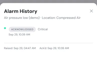 The Alarm History sheet for Air pressure low (demo), showing an Acknowledged event at Critical, and the raised and acknowledged times
