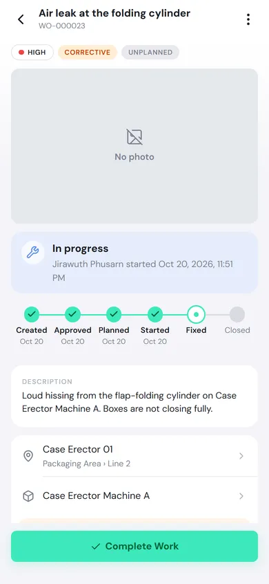 Work order WO-000023 In progress, showing who started it and when, the progress bar, and the Complete Work button at the bottom